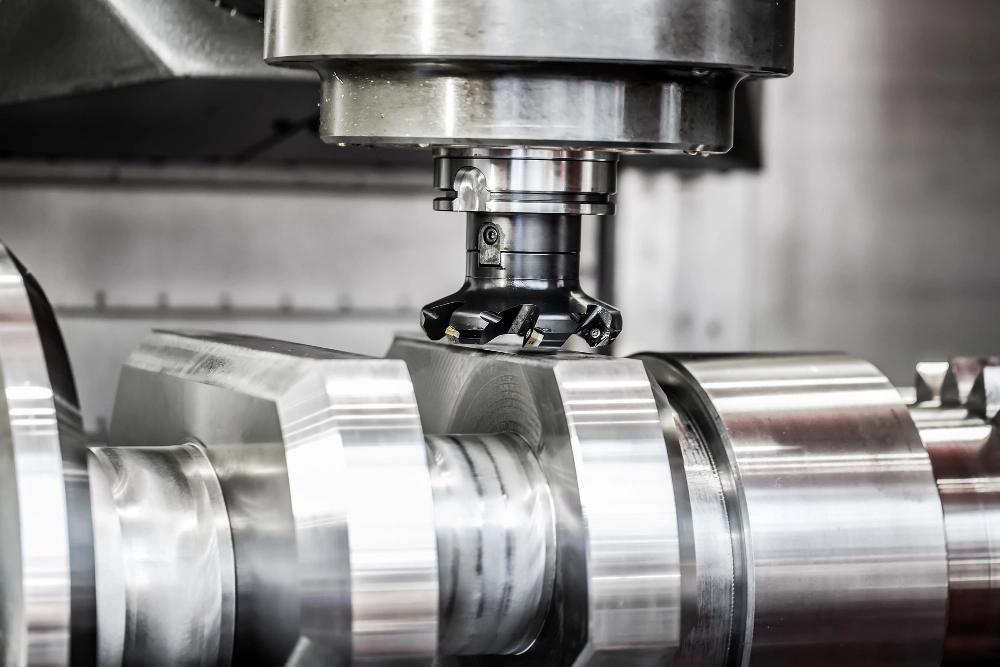 CNC mill cutting a machined part